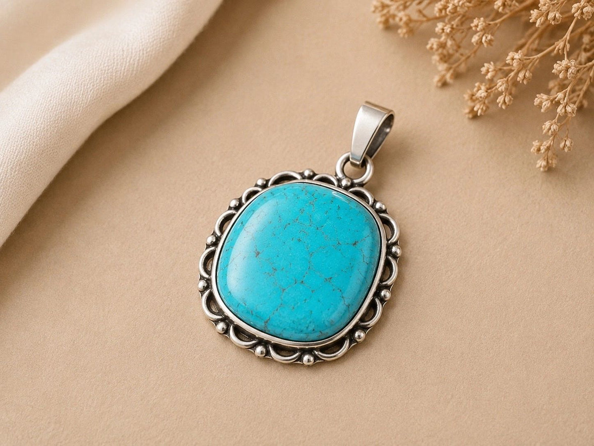 Turquoise Scrollwork Sterling Silver Pendant.